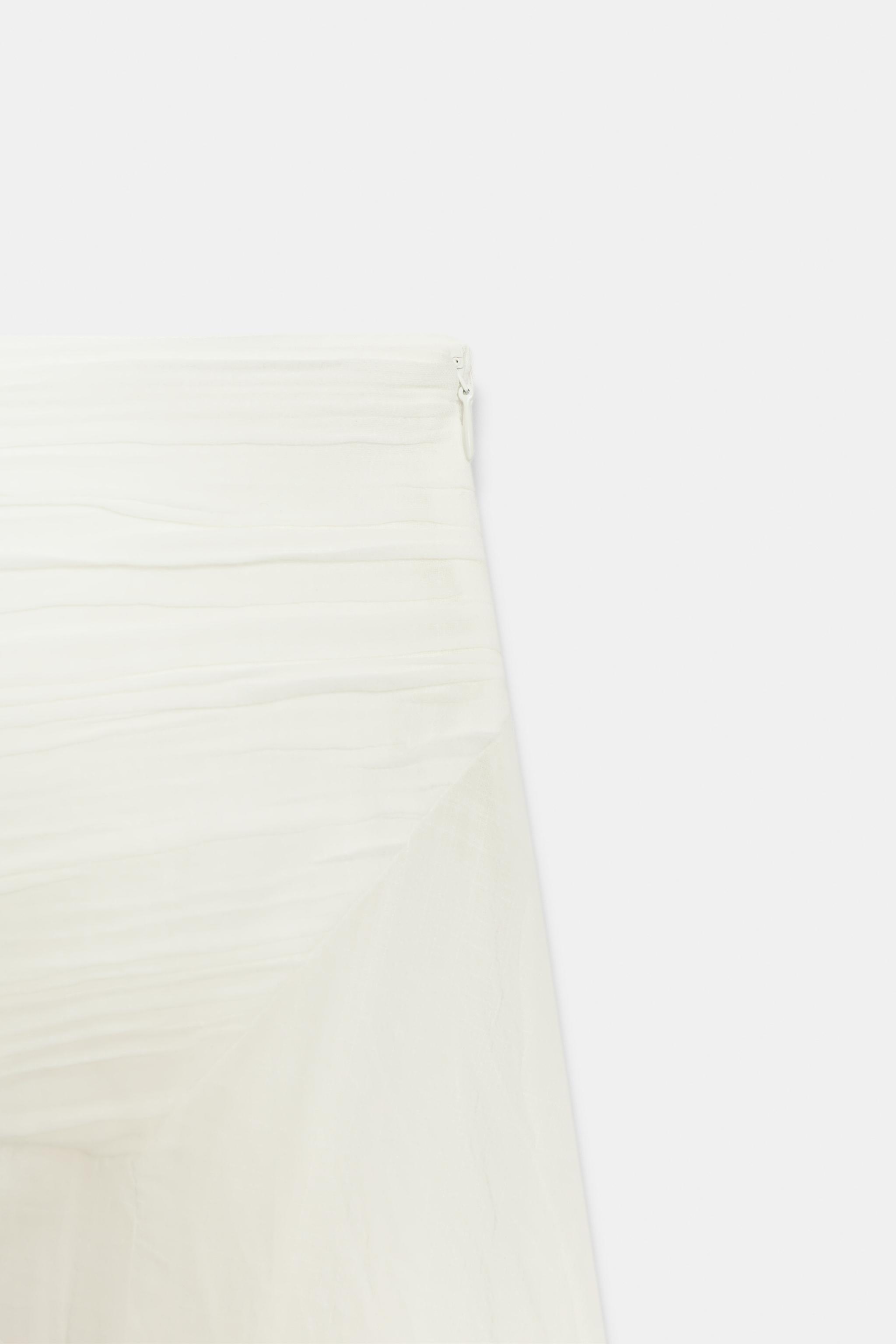 JUPE ASYMÉTRIQUE EN TISSU RUSTIQUE